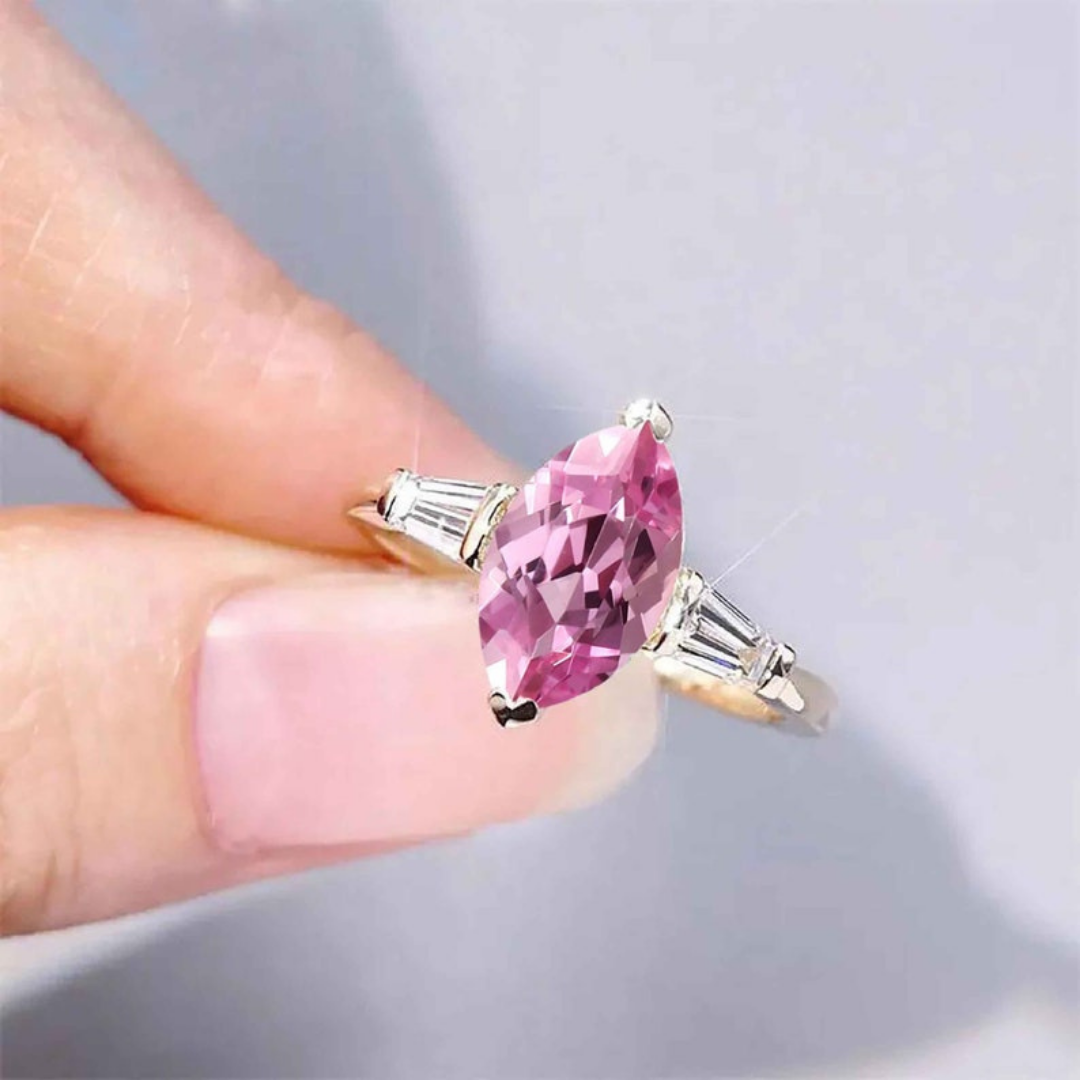 Ethereal Rose Ring™ Luxury Ring – Marquise Pink Sapphire with Tapered Accents in Rose Gold
