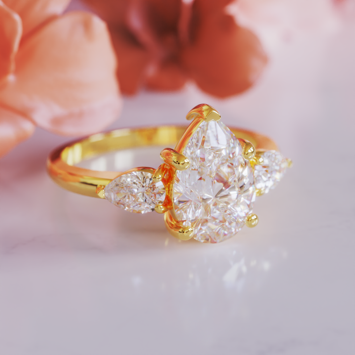 The Nola Ring™ Colored Gem Stone – Radiant Grace in a Triple-Stone Teardrop Design