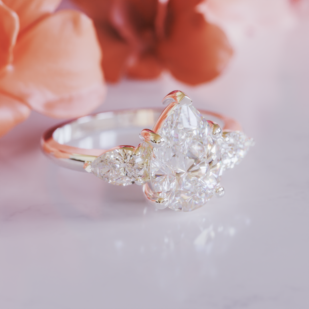 The Nola Ring™ Colored Gem Stone – Radiant Grace in a Triple-Stone Teardrop Design