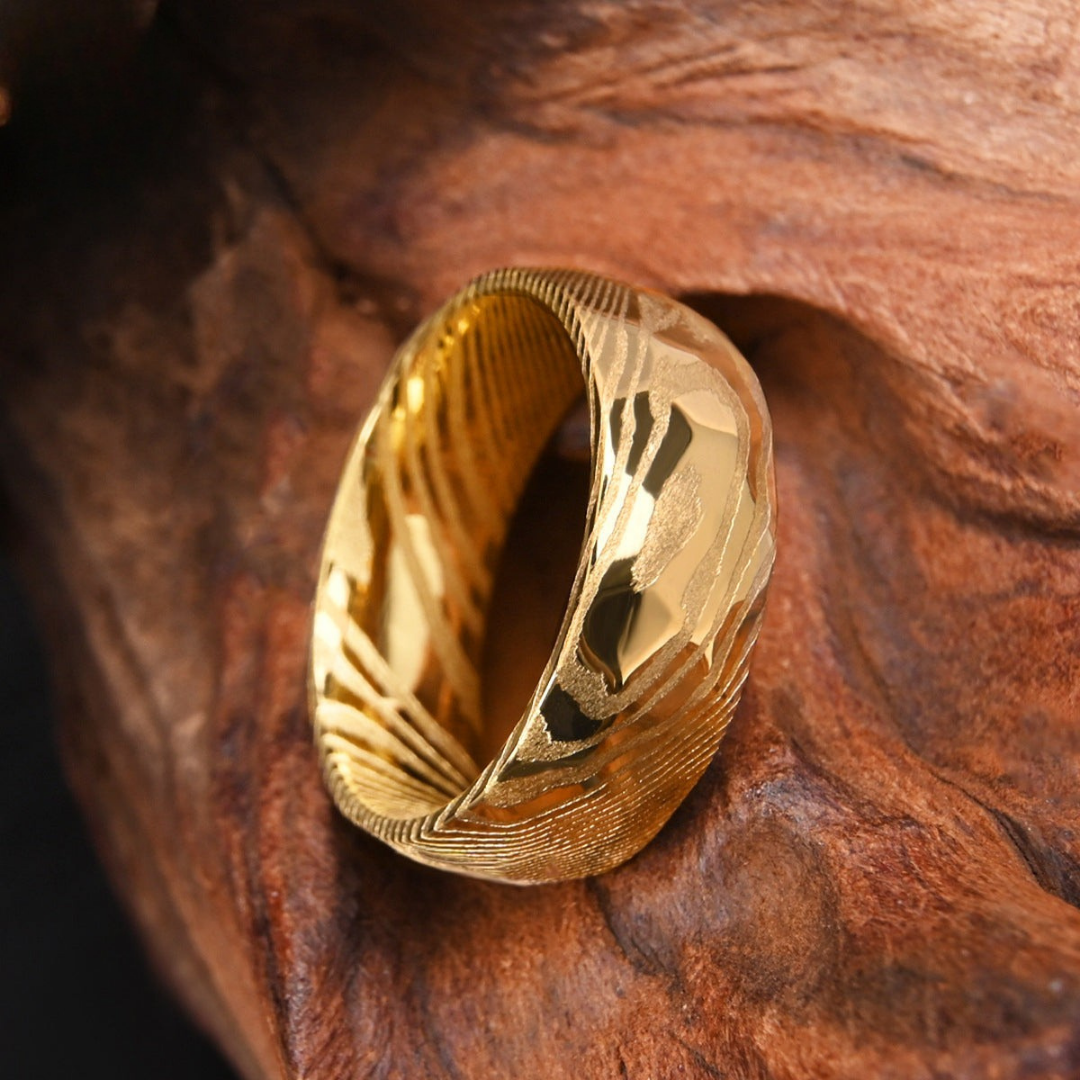 Draxor™ – 18K Gold-Plated Damascus Steel Ring