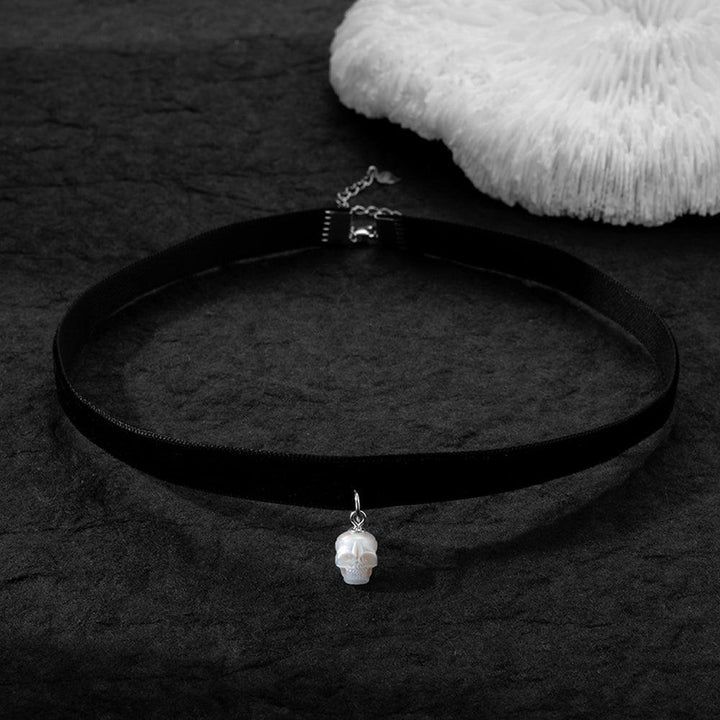 Black Velvet Pearl Skull Choker Necklace™ Skull Accessories  – Gothic Elegance with a Pearlescent Edge