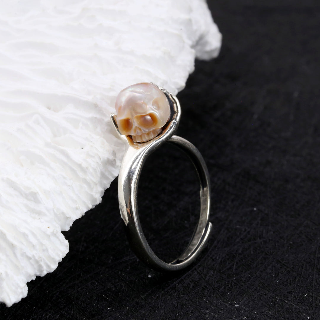 Cranium Pearl In Hand Ring™ Skull Accessories  - Adjustable Retro Ring with Pearl Skull in Sculpted Hand