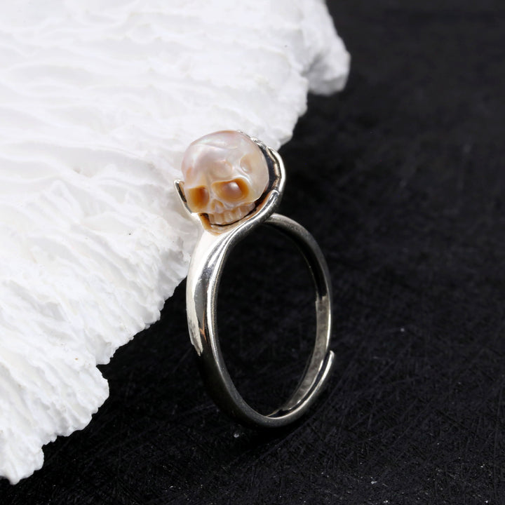 Cranium Pearl In Hand Ring™ Skull Accessories  - Adjustable Retro Ring with Pearl Skull in Sculpted Hand
