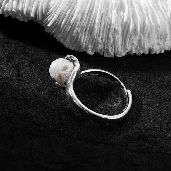 Cranium Pearl In Hand Ring™ Skull Accessories  - Adjustable Retro Ring with Pearl Skull in Sculpted Hand