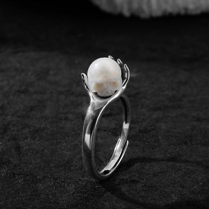 Cranium Pearl In Hand Ring™ Skull Accessories  - Adjustable Retro Ring with Pearl Skull in Sculpted Hand