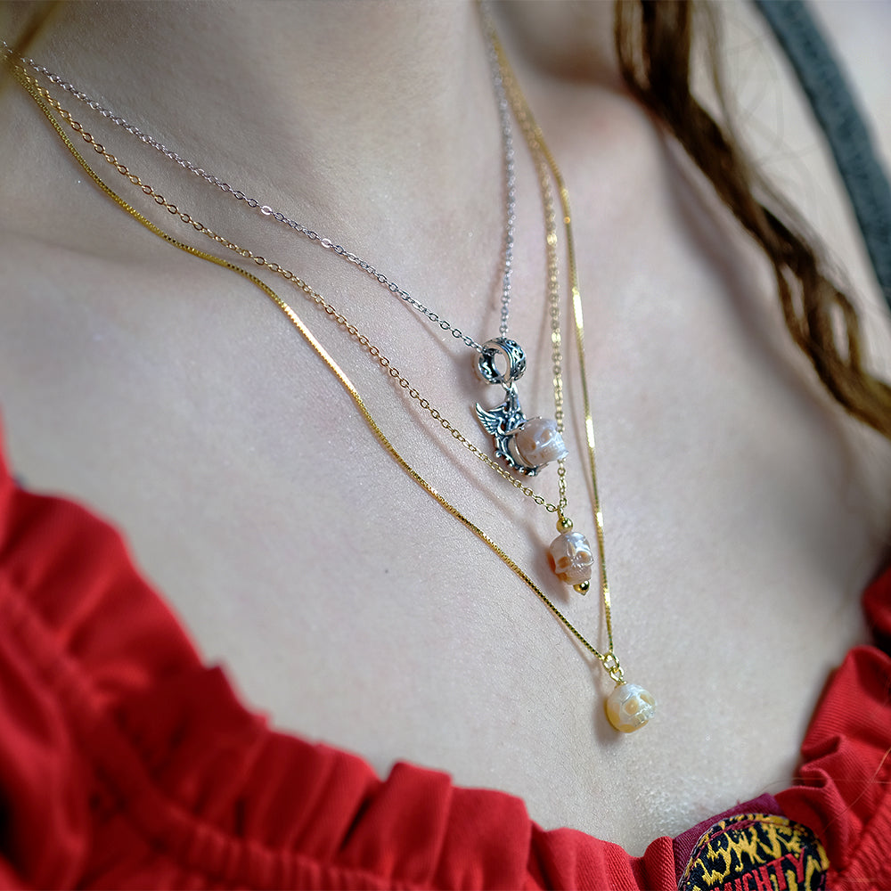 Minimalist Pearl Skull Necklace with Elegant Golden Beads™ Skull Accessories  – Understated Power in Every Detail
