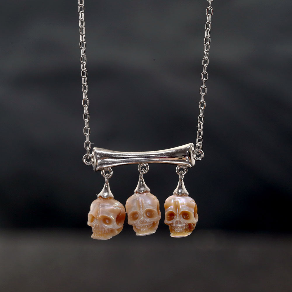 Gothic Three Stone Pearl Skulls Necklace™ Skull Accessories – Elegance Entwined with Mystery