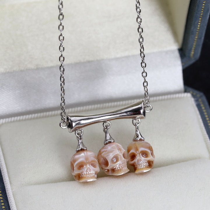 Gothic Three Stone Pearl Skulls Necklace™ Skull Accessories – Elegance Entwined with Mystery