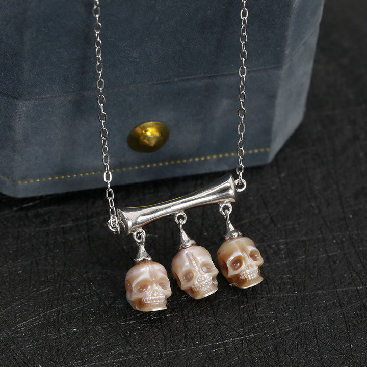Gothic Three Stone Pearl Skulls Necklace™ Skull Accessories – Elegance Entwined with Mystery