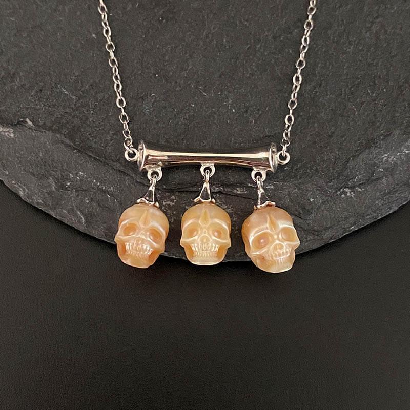 Gothic Three Stone Pearl Skulls Necklace™ Skull Accessories – Elegance Entwined with Mystery