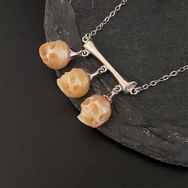 Gothic Three Stone Pearl Skulls Necklace™ Skull Accessories – Elegance Entwined with Mystery