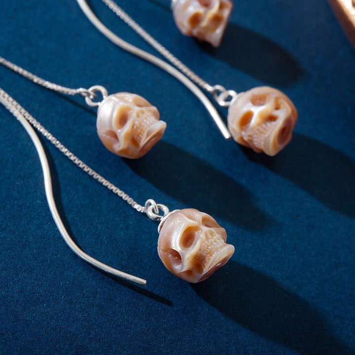 Modern Impressions Pearl Skull Tassel Earrings™ Skull Accessories - Contemporary Elegance with an Edgy Twist