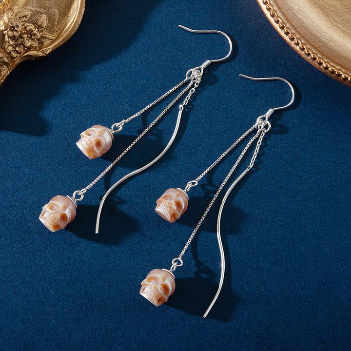 Modern Impressions Pearl Skull Tassel Earrings™ Skull Accessories - Contemporary Elegance with an Edgy Twist