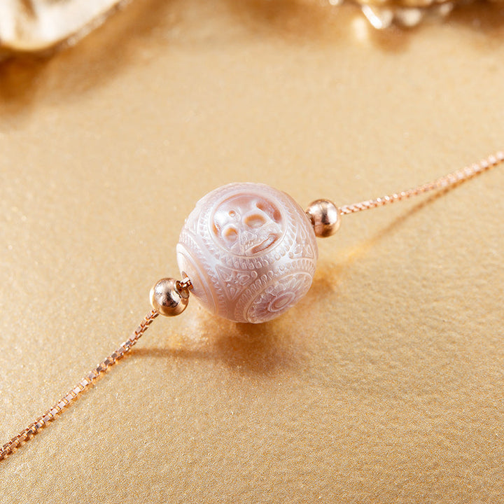 Pearl Carved Skull Round Bead Dainty Necklace™ Skull Accessories  – Sculpted Elegance in Soft Orchid Tones