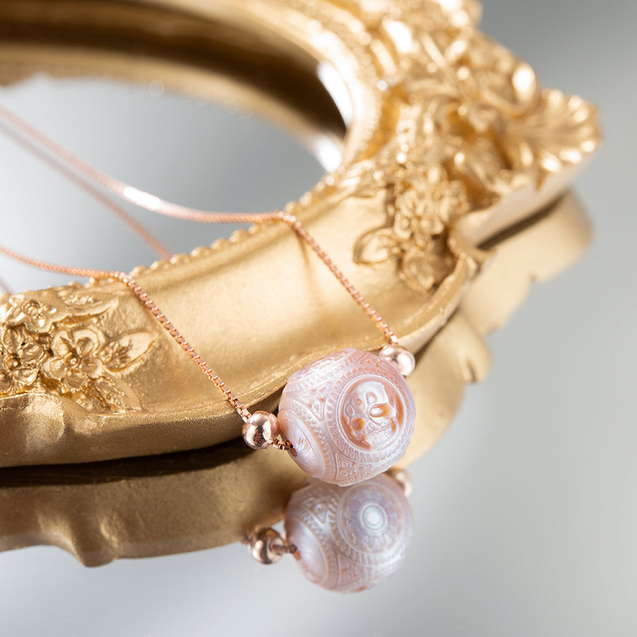 Pearl Carved Skull Round Bead Dainty Necklace™ Skull Accessories  – Sculpted Elegance in Soft Orchid Tones
