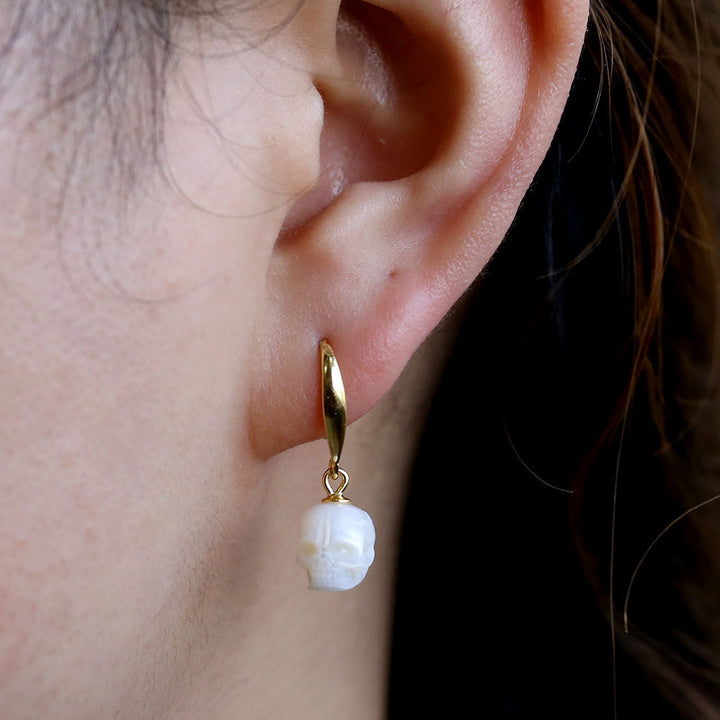 Tapered Pearl Skull Dangle Hook Earrings™ Skull Accessories – Gold-Plated Hook Earrings with Carved Pearl Skull Charms