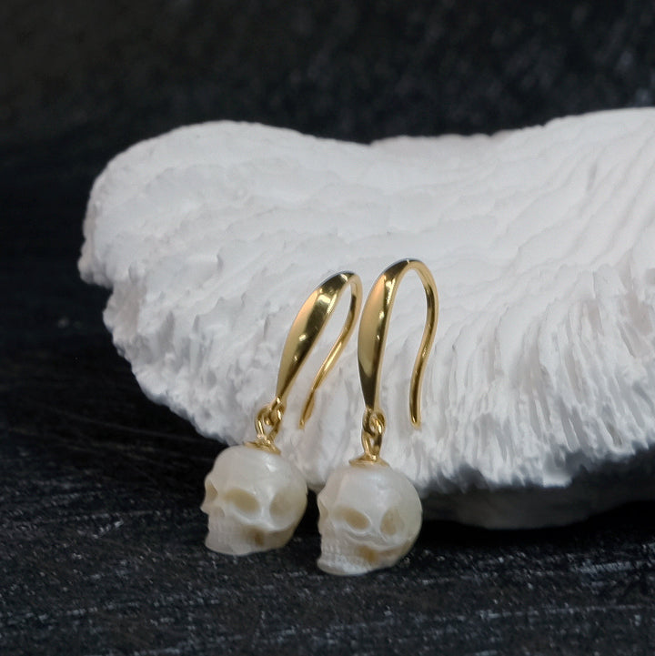 Tapered Pearl Skull Dangle Hook Earrings™ Skull Accessories – Gold-Plated Hook Earrings with Carved Pearl Skull Charms