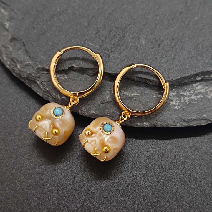 Gemstone Eyes Śmaśana Pearl Skull Hoop Earrings™ Skull Accessories - Gold Hoop Earrings with Pearl Skulls and Healing Gemstone Accents